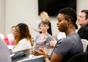 woman speaking in class