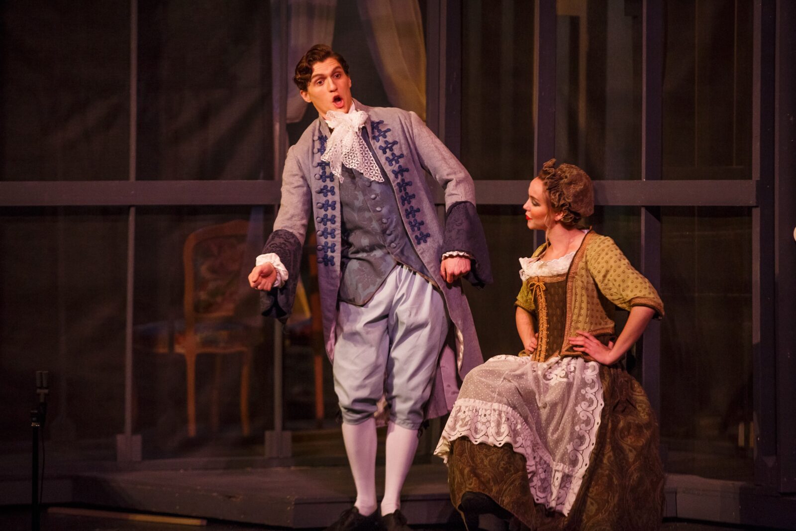 people performing period piece in play