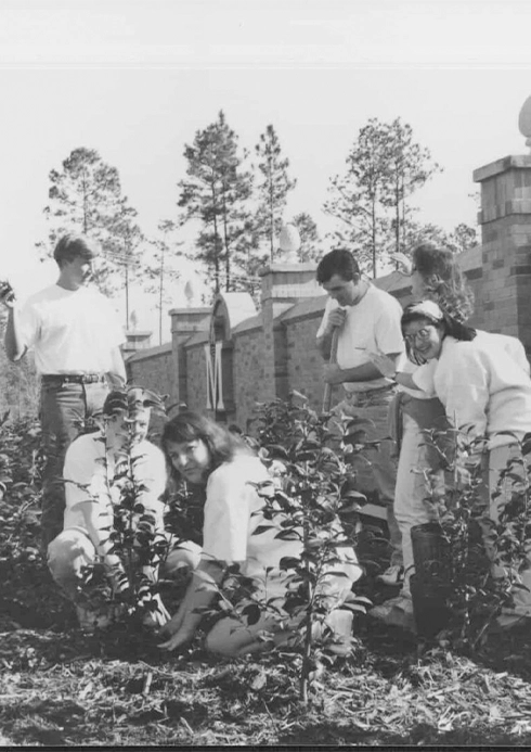 students planting landscaping